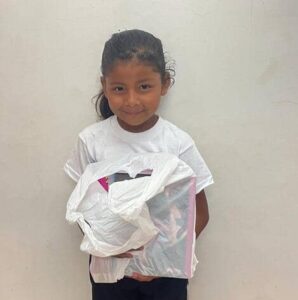Girl with supplies